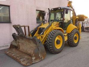 ����������-��������� New Holland B 115 (����)