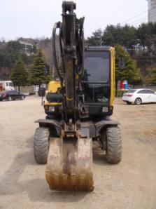 Экскаватор колесный полноприводный Volvo EW 55 2006 год (Фото)